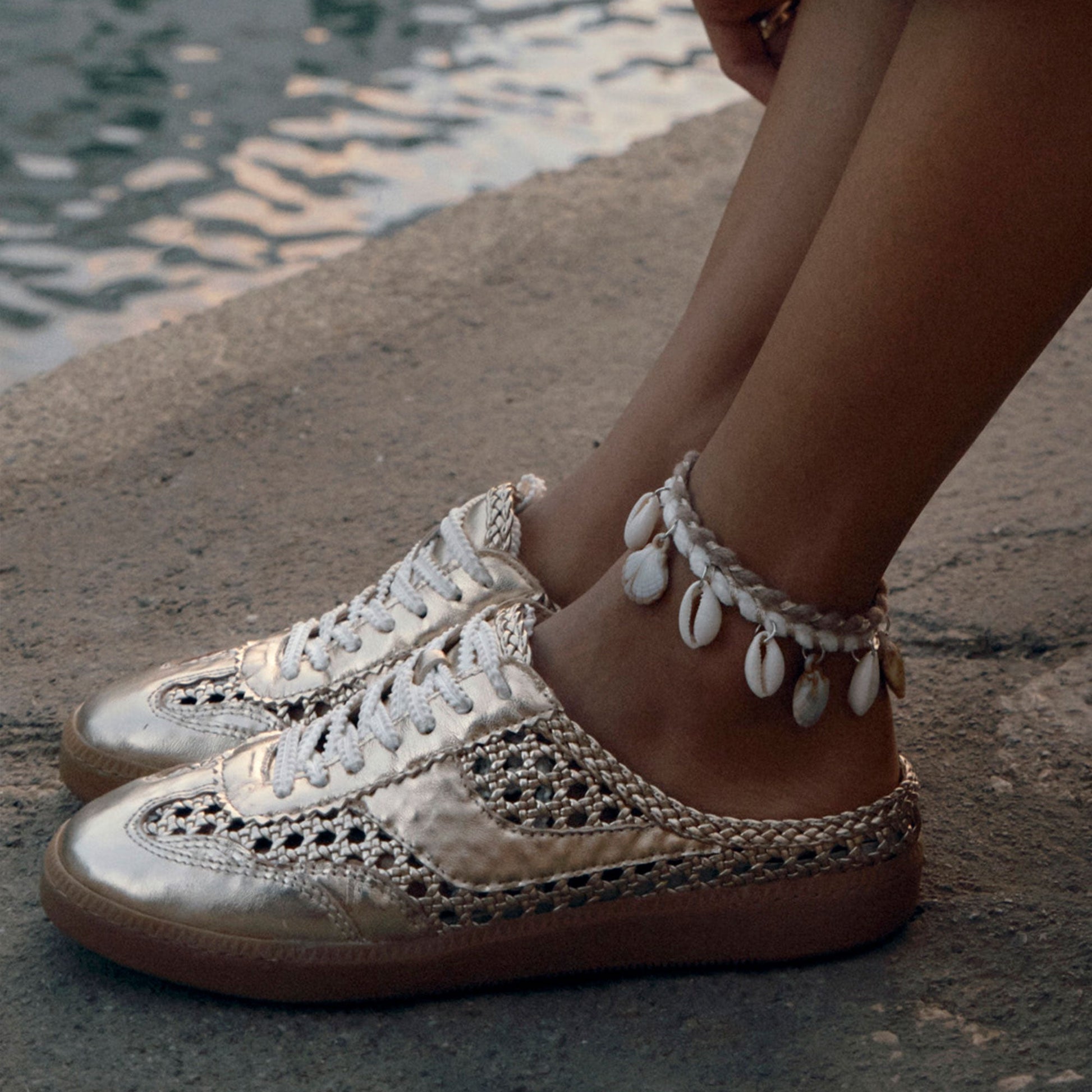 Dolce Vita Notice Slide Gold Woven Stella Sneakers